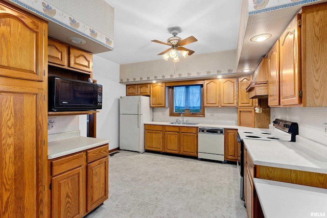 16905 E 1600th St, Bushnell, IL 61422 - kitchen with white appliances, ceiling fan, and light countertops