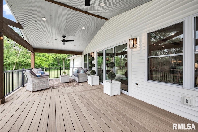 12804 W Dell Rd, Princeville, IL 61559 - wooden deck with a ceiling fan and an outdoor hangout area