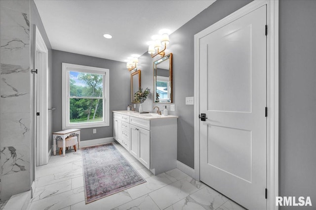 12804 W Dell Rd, Princeville, IL 61559 - full bath with marble look tile flooring, double vanity, and recessed lighting