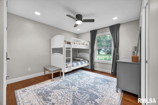 12804 W Dell Rd, Princeville, IL 61559 - bedroom with wood finished floors, a ceiling fan, and recessed lighting