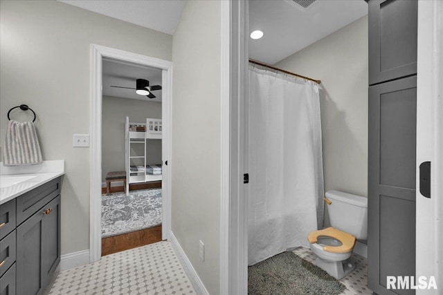 12804 W Dell Rd, Princeville, IL 61559 - bathroom with tile patterned floors, vanity, curtained shower, and ceiling fan