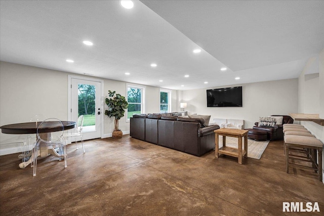 12804 W Dell Rd, Princeville, IL 61559 - living area featuring recessed lighting and finished concrete floors