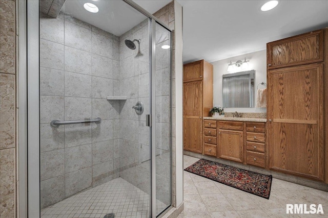 12804 W Dell Rd, Princeville, IL 61559 - full bathroom with a stall shower, vanity, tile patterned floors, and recessed lighting