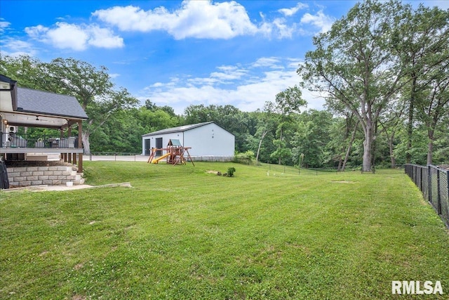 12804 W Dell Rd, Princeville, IL 61559 - fenced backyard with a playground