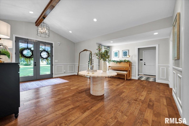 12804 W Dell Rd, Princeville, IL 61559 - foyer with a decorative wall, french doors, wood finished floors, a wainscoted wall, and a chandelier