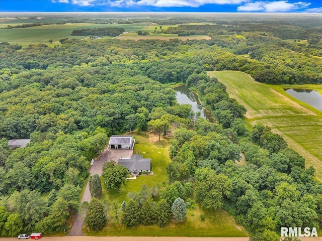 12804 W Dell Rd, Princeville, IL 61559 - aerial view of property's location with a nearby body of water and a forest