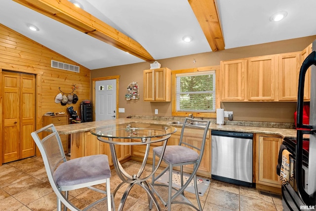 175 Lakecrest Pl, Dahinda, IL 61488 - kitchen featuring stainless steel dishwasher, a peninsula, wooden walls, stove, and light brown cabinetry