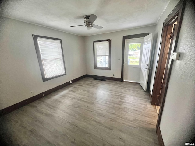 407 E Depot St, Knoxville, IL 61448 - unfurnished room with wood finished floors and ceiling fan