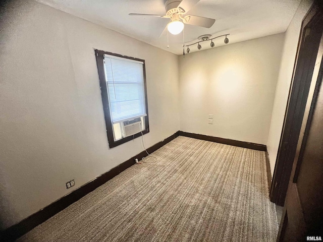 407 E Depot St, Knoxville, IL 61448 - empty room with cooling unit, carpet, and ceiling fan