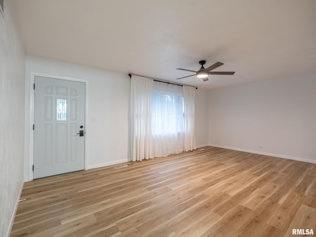 410 Stout Dr, Mackinaw, IL 61755 - entryway featuring a ceiling fan and light wood-type flooring