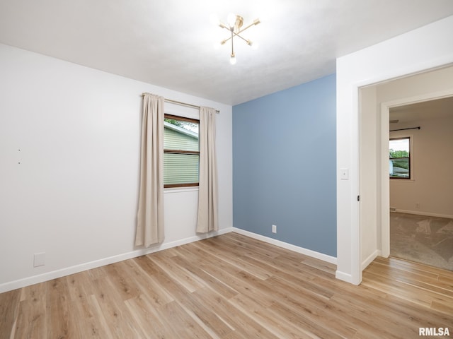 410 Stout Dr, Mackinaw, IL 61755 - unfurnished room with light wood-style flooring