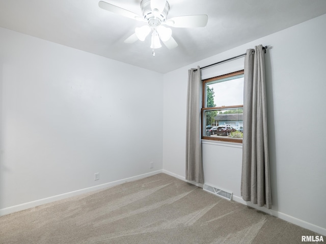 410 Stout Dr, Mackinaw, IL 61755 - carpeted empty room featuring ceiling fan and baseboards