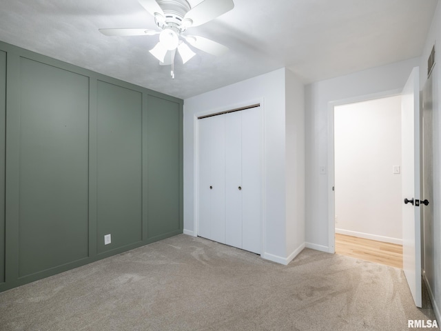 410 Stout Dr, Mackinaw, IL 61755 - unfurnished bedroom featuring carpet and a ceiling fan