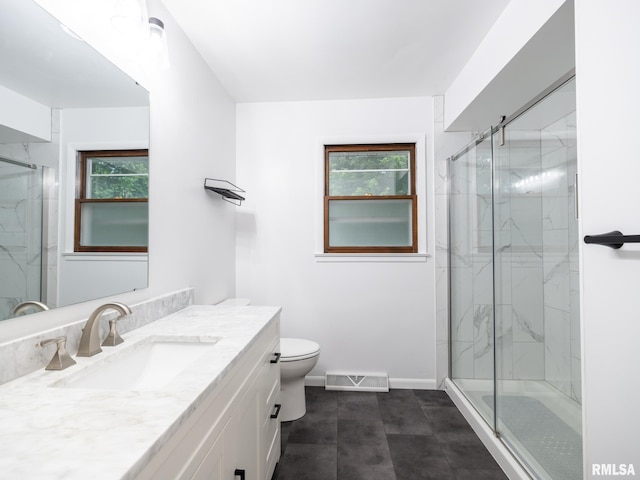 410 Stout Dr, Mackinaw, IL 61755 - bathroom featuring vanity and a marble finish shower