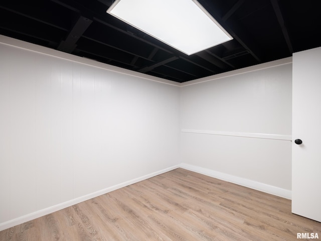 410 Stout Dr, Mackinaw, IL 61755 - unfurnished room with wood finished floors and baseboards