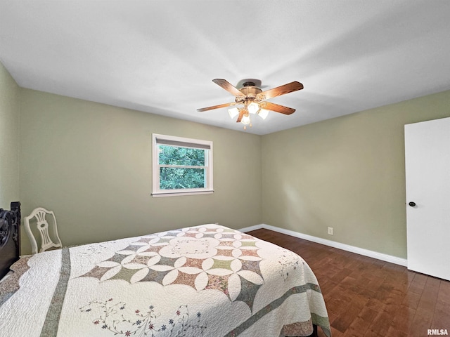 490 Oak Point Rd, Metamora, IL 61548 - bedroom with dark wood-style flooring and a ceiling fan
