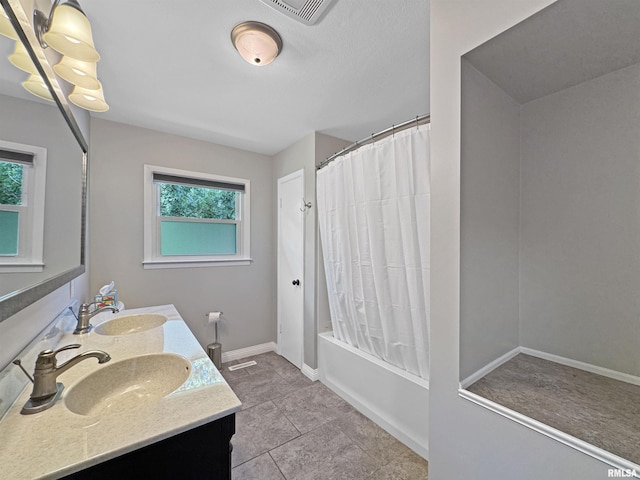 490 Oak Point Rd, Metamora, IL 61548 - bathroom featuring double vanity, tile patterned flooring, and shower / bath combo with shower curtain