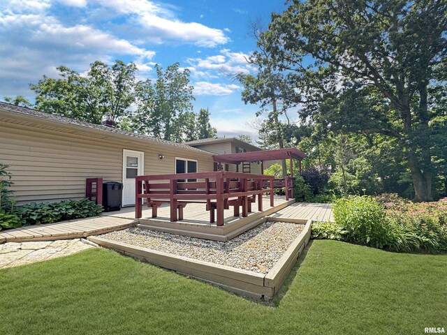 490 Oak Point Rd, Metamora, IL 61548 - wooden deck with a yard