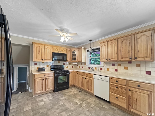 490 Oak Point Rd, Metamora, IL 61548 - kitchen with black appliances, ornamental molding, a ceiling fan, light countertops, and decorative light fixtures