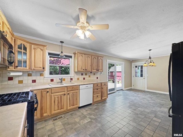 490 Oak Point Rd, Metamora, IL 61548 - kitchen with black appliances, tasteful backsplash, light countertops, a textured ceiling, and glass insert cabinets
