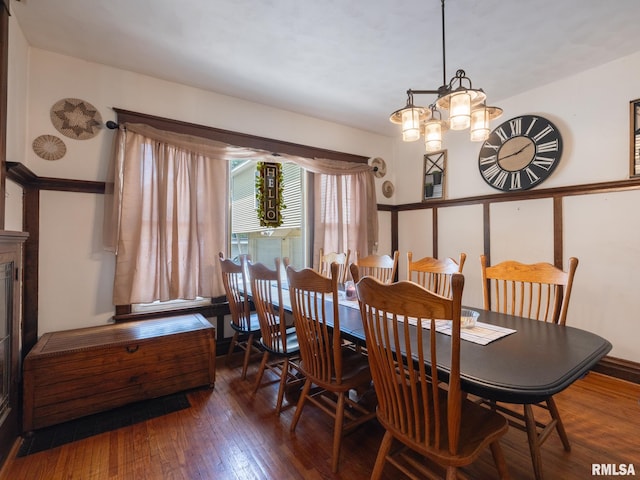 405 Washington St, Pekin, IL 61554 - dining room featuring hardwood / wood-style flooring and a chandelier