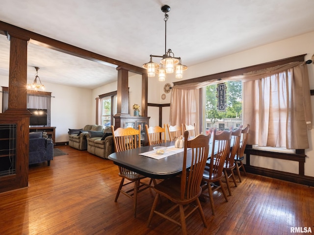 405 Washington St, Pekin, IL 61554 - dining area featuring hardwood / wood-style flooring, a chandelier, and a fireplace