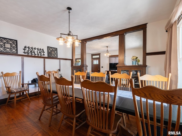 405 Washington St, Pekin, IL 61554 - dining area with wood finished floors and ornate columns