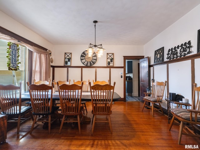 405 Washington St, Pekin, IL 61554 - dining area with wood finished floors and a chandelier