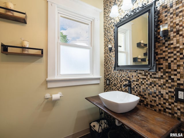405 Washington St, Pekin, IL 61554 - bathroom with backsplash and vanity