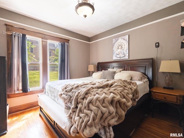 405 Washington St, Pekin, IL 61554 - bedroom featuring wood finished floors