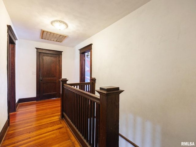 405 Washington St, Pekin, IL 61554 - hall with wood finished floors and an upstairs landing