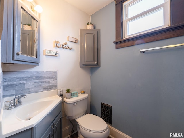 405 Washington St, Pekin, IL 61554 - bathroom featuring toilet and vanity