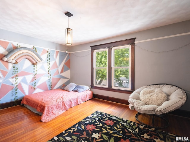 405 Washington St, Pekin, IL 61554 - bedroom with wood finished floors and baseboards
