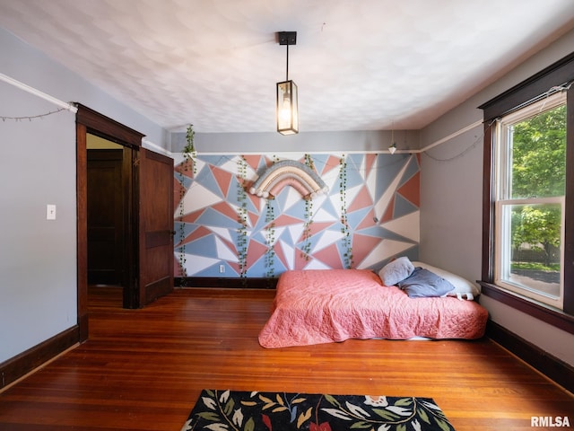 405 Washington St, Pekin, IL 61554 - bedroom featuring hardwood / wood-style floors and baseboards