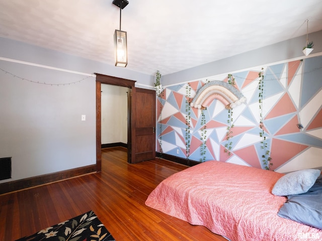 405 Washington St, Pekin, IL 61554 - bedroom with wood-type flooring and baseboards