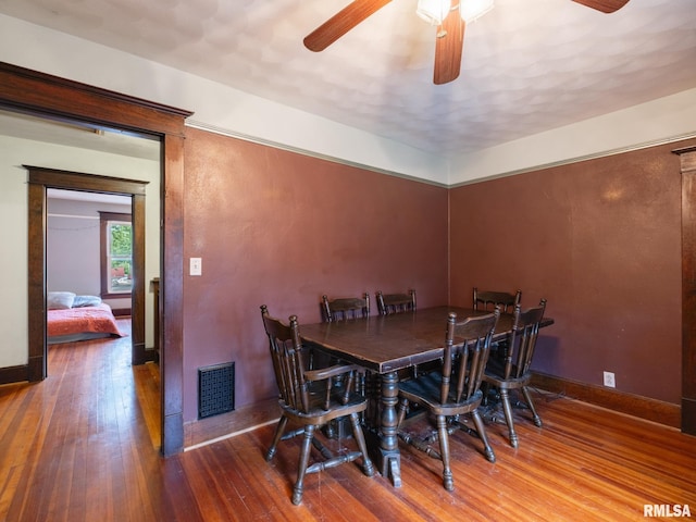 405 Washington St, Pekin, IL 61554 - dining room with a ceiling fan and wood-type flooring