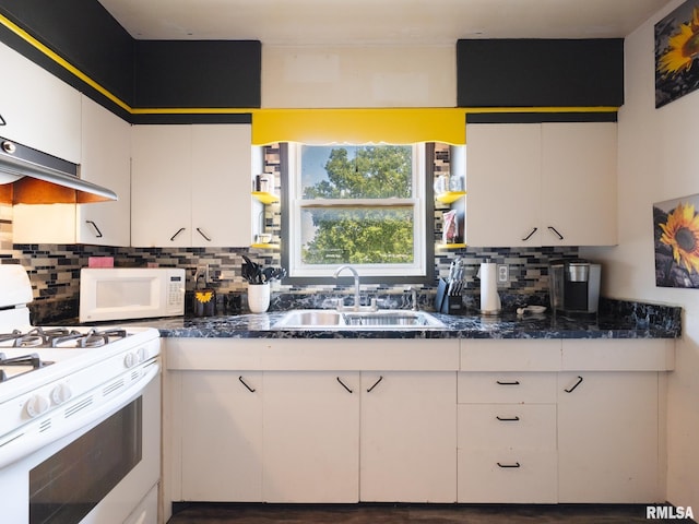405 Washington St, Pekin, IL 61554 - kitchen featuring white appliances, white cabinetry, decorative backsplash, and dark stone countertops