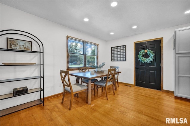 1208 S Adams Rd, Eureka, IL 61530 - dining room with light wood-style floors and recessed lighting