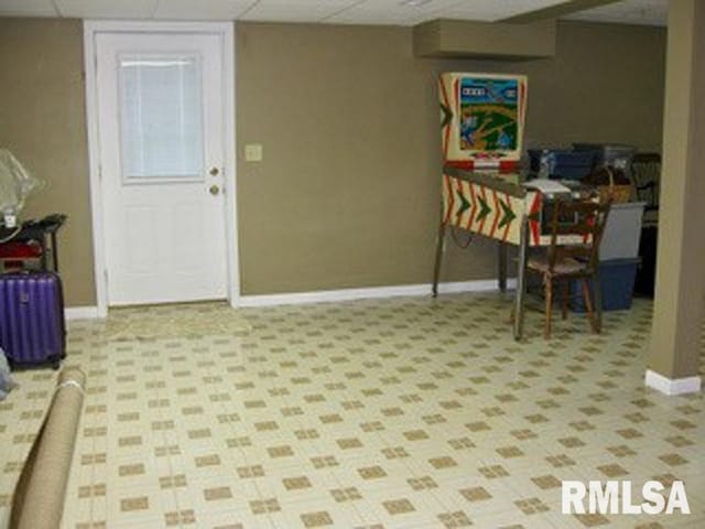 17215 N Mangold Rd, Edelstein, IL 61526 - finished below grade area featuring a drop ceiling and baseboards