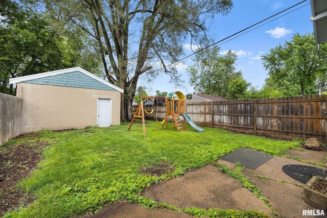 2017 W Laura Ave, West Peoria, IL 61604 - fenced backyard featuring a playground
