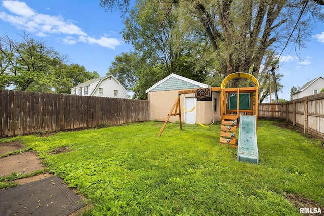 2017 W Laura Ave, West Peoria, IL 61604 - fenced backyard with a playground