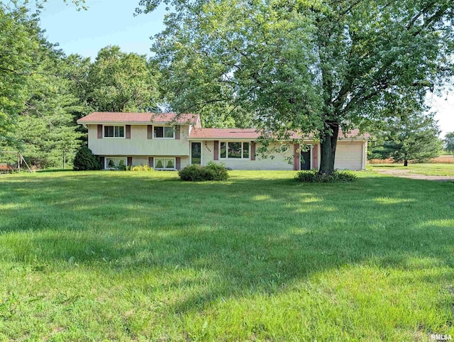 6646 Mason Rd, Manito, IL 61546 - split level home with a front yard and a garage