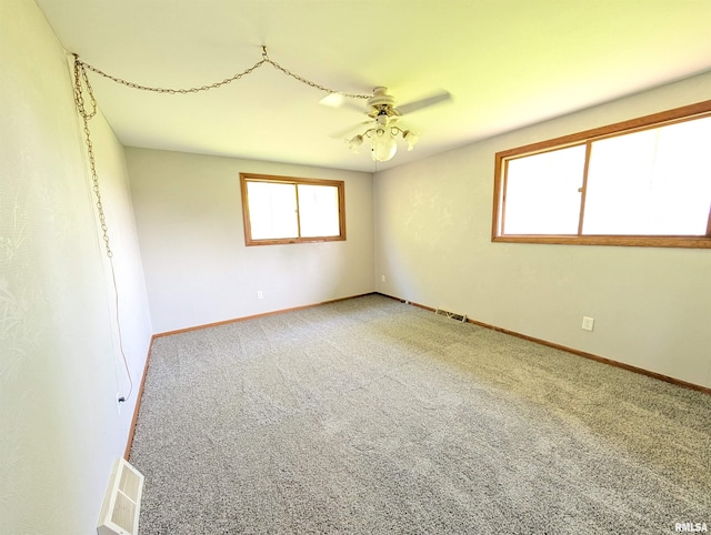 6646 Mason Rd, Manito, IL 61546 - unfurnished room with carpet floors and ceiling fan