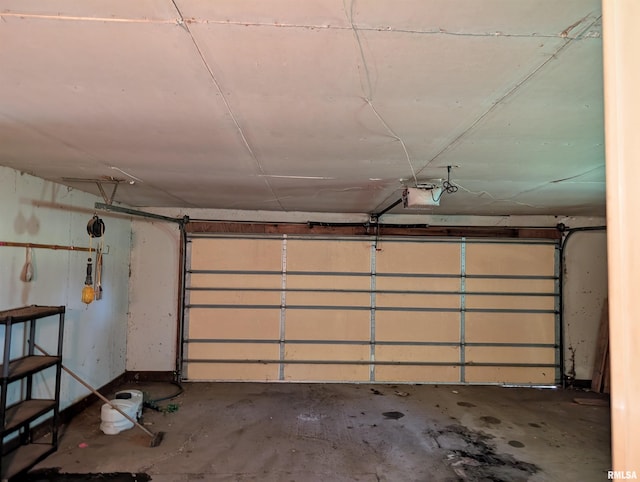 6646 Mason Rd, Manito, IL 61546 - garage featuring a garage door opener