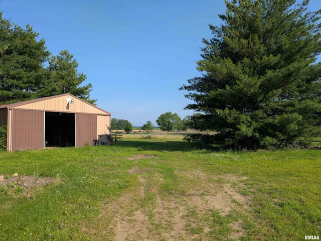 6646 Mason Rd, Manito, IL 61546 - view of yard featuring an outbuilding and an outdoor structure