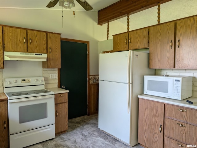 6646 Mason Rd, Manito, IL 61546 - kitchen with white appliances, under cabinet range hood, light countertops, and backsplash