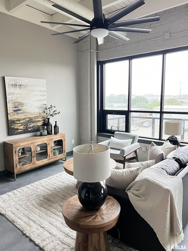 1001 SW Adams St Unit 101, Peoria, IL 61602 - living area featuring ceiling fan and plenty of natural light