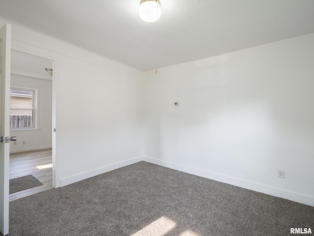 1108 Mechanic St, Pekin, IL 61554 - carpeted spare room featuring baseboards