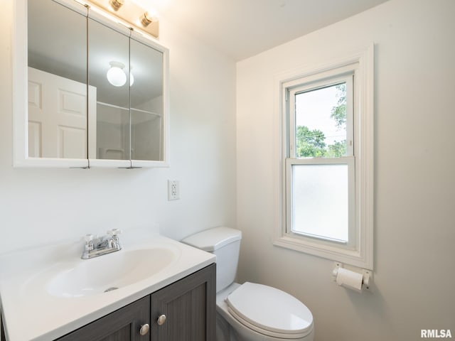 1108 Mechanic St, Pekin, IL 61554 - bathroom featuring plenty of natural light, vanity, and a shower