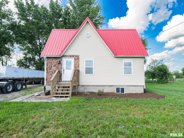 21218 E County Highway 17, Canton, IL 61520 - view of front of home with a front yard and a metal roof
